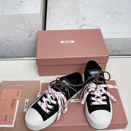 WASHED-DENIM SNEAKERS IN BLACK CANVAS WITH BROWN AND STRIPED LACES