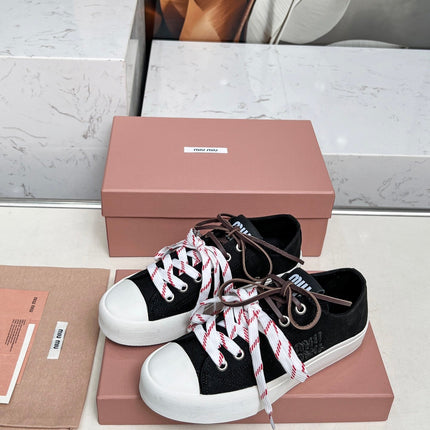 WASHED-DENIM SNEAKERS IN BLACK CANVAS WITH BROWN AND STRIPED LACES