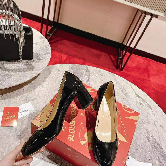 LOUBI DÉCOLLETÉ PUMPS IN BLACK CALFSKIN