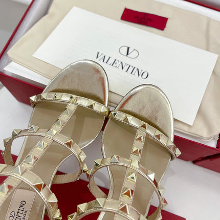 ROCKSTUD 100 GOLD METALLIC CALFSKIN ANKLE STRAP HIGH SANDAL