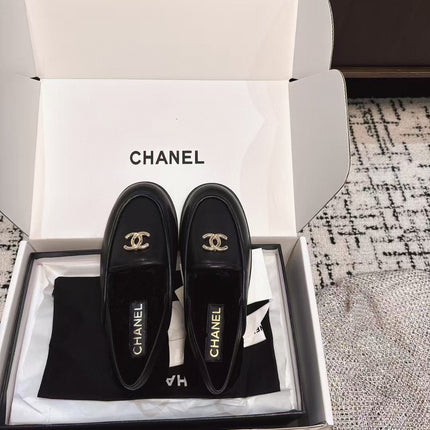 SLINGBACK LOAFER IN BLACK CALFSKIN AND SHEARLING