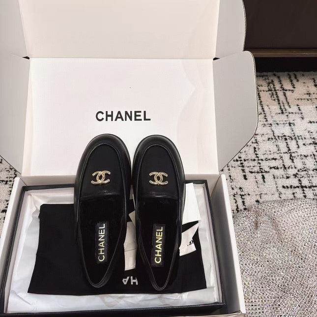 SLINGBACK LOAFER IN BLACK CALFSKIN AND SHEARLING