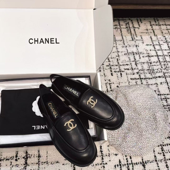 SLINGBACK LOAFER IN BLACK CALFSKIN AND SHEARLING