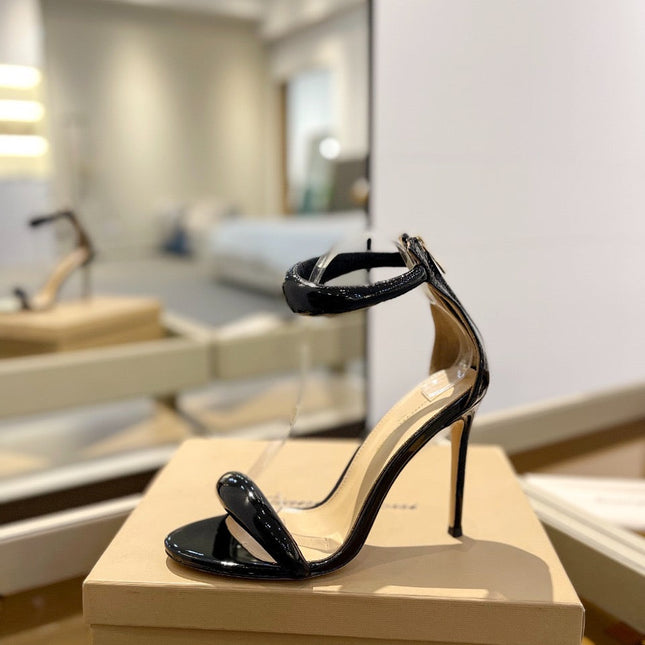 STILETTO SANDALS IN BLACK PATENT CALFSKIN WITH MINIMALIST STRAP DESIGN