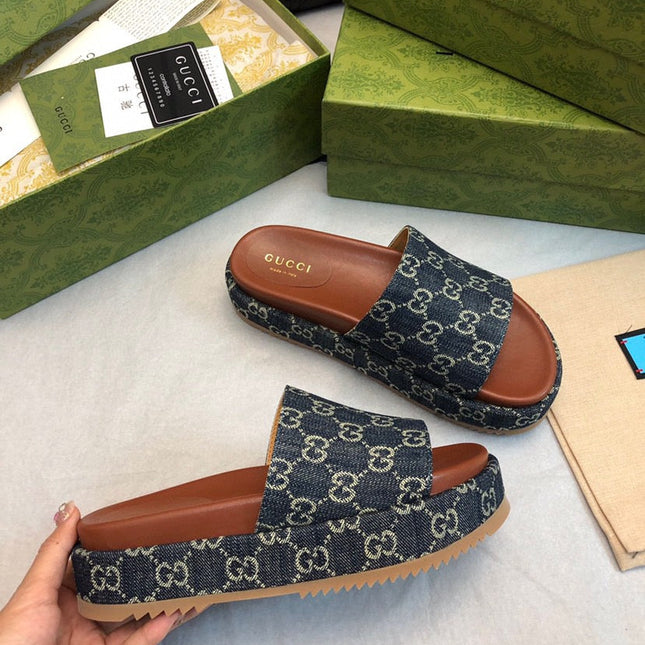 GG THICK PLATFORM SLIDES IN BLUE MONOGRAM EMBOSSED FABRIC