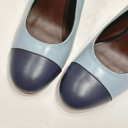 CC SLINGBACK PUMPS IN BLUE AND BLACK CALFSKIN