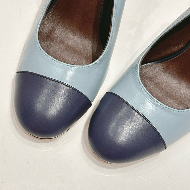 CC SLINGBACK PUMPS IN BLUE AND BLACK CALFSKIN