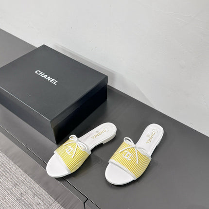 CC STRIPED SLIDE SANDALS IN YELLOW AND WHITE CANVAS