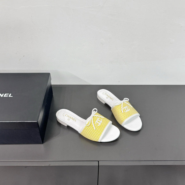 CC STRIPED SLIDE SANDALS IN YELLOW AND WHITE CANVAS