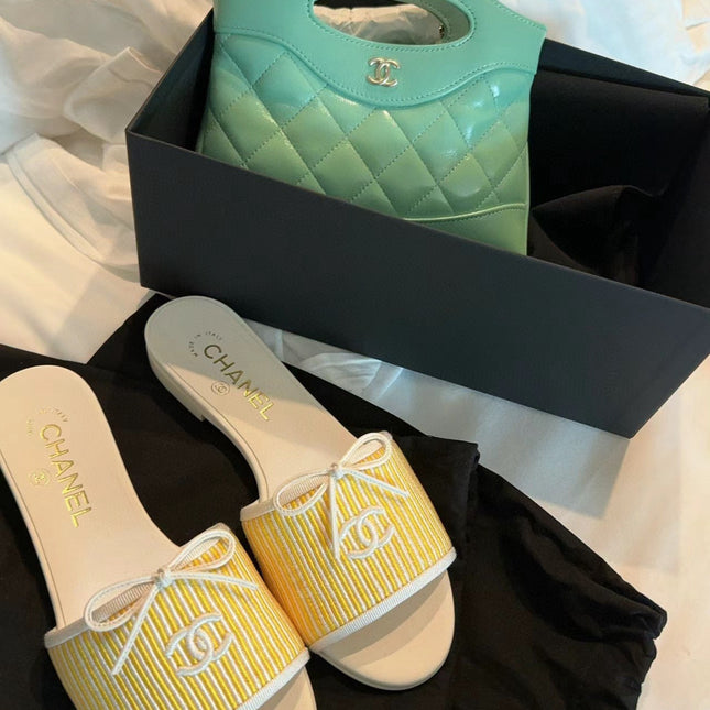 CC STRIPED SLIDE SANDALS IN YELLOW AND WHITE CANVAS