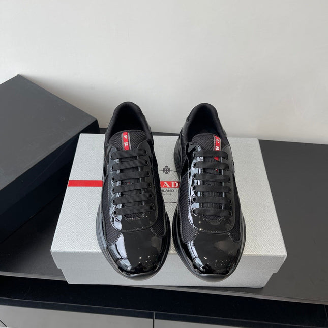 PRADA SNEAKER 25S IN BLACK MESH AND PATENT CALFSKIN