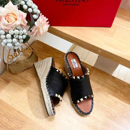 LACE-UP WEDGE SANDALS IN BLACK CALFSKIN WITH STUDS