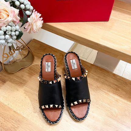 LACE-UP WEDGE SANDALS IN BLACK CALFSKIN WITH STUDS