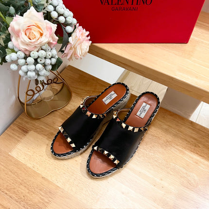 LACE-UP WEDGE SANDALS IN BLACK CALFSKIN WITH STUDS