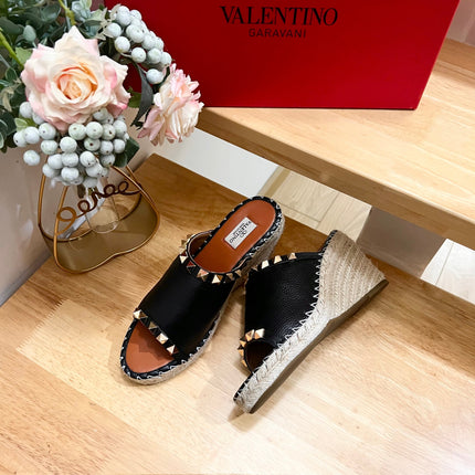 LACE-UP WEDGE SANDALS IN BLACK CALFSKIN WITH STUDS