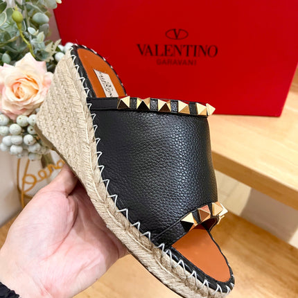 LACE-UP WEDGE SANDALS IN BLACK CALFSKIN WITH STUDS