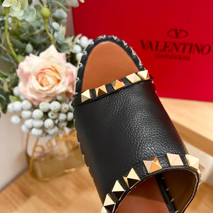 LACE-UP WEDGE SANDALS IN BLACK CALFSKIN WITH STUDS