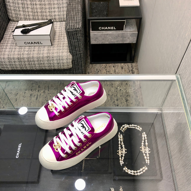 CASUAL SNEAKER IN MAGENTA PURPLE METALLIC LAMBSKIN WITH GOLD LOGO