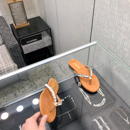 THONG SLIDE IN BRONZE BROWN SUEDE WITH WHITE CRYSTALS