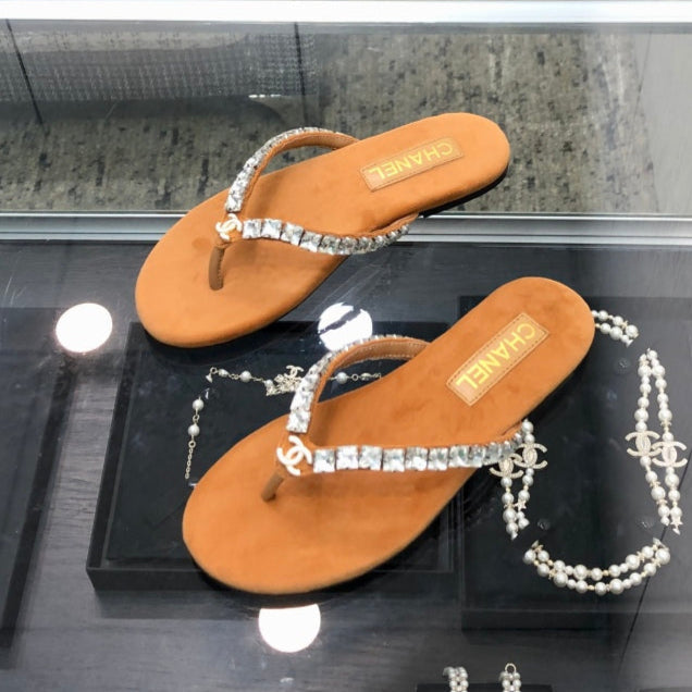 THONG SLIDE IN BRONZE BROWN SUEDE WITH WHITE CRYSTALS