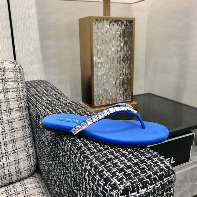 THONG SLIDE IN COBALT BLUE SUEDE WITH WHITE CRYSTALS