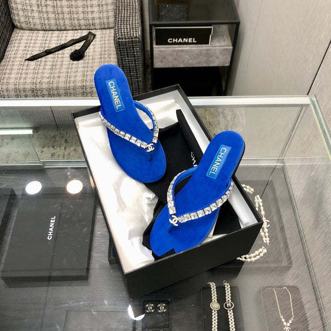 THONG SLIDE IN COBALT BLUE SUEDE WITH WHITE CRYSTALS