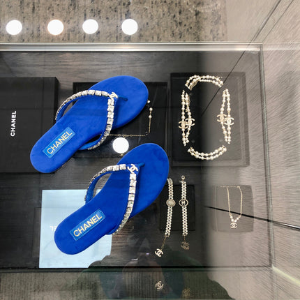THONG SLIDE IN COBALT BLUE SUEDE WITH WHITE CRYSTALS