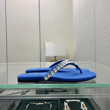 THONG SLIDE IN COBALT BLUE SUEDE WITH WHITE CRYSTALS