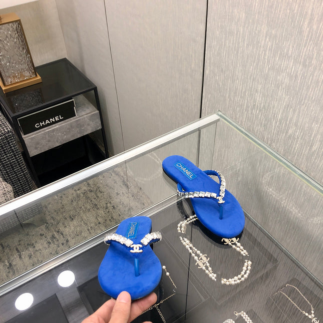 THONG SLIDE IN COBALT BLUE SUEDE WITH WHITE CRYSTALS