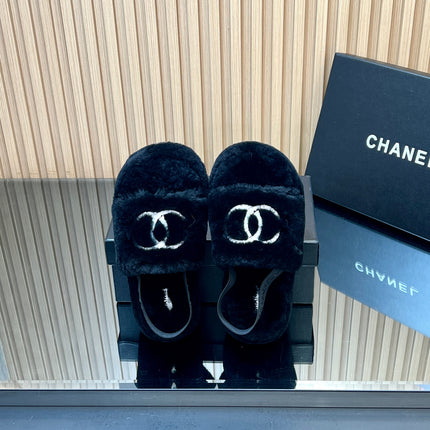 CHANEL 25S THICK-SOLED FURRY SLIPPERS WITH ELASTIC STRAPS IN BLACK FUR
