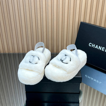CHANEL 25S THICK-SOLED FURRY SLIPPERS WITH ELASTIC STRAPS IN WHITE FUR