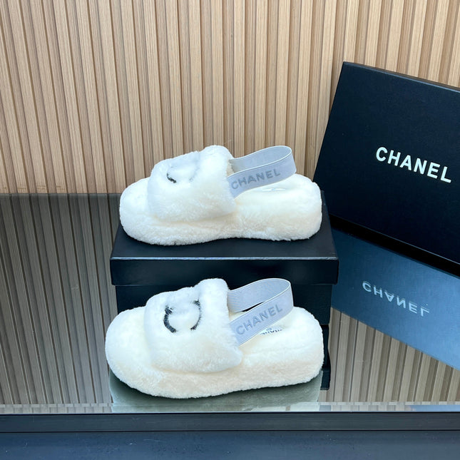 CHANEL 25S THICK-SOLED FURRY SLIPPERS WITH ELASTIC STRAPS IN WHITE FUR