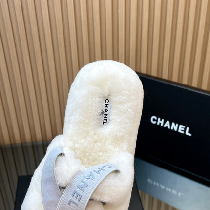 CHANEL 25S THICK-SOLED FURRY SLIPPERS WITH ELASTIC STRAPS IN WHITE FUR