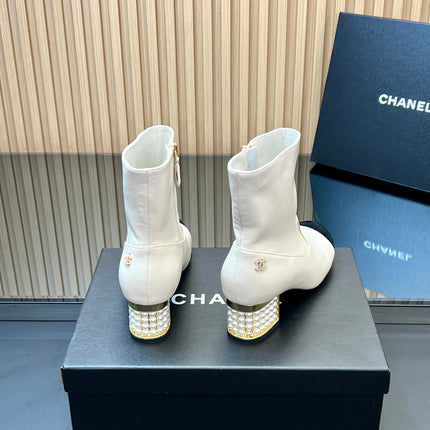 CHANEL 25S TALL BOOTS WITH PEARL DETAILS 50MM IN WHITE CALFSKIN AND BLACK SUEDE