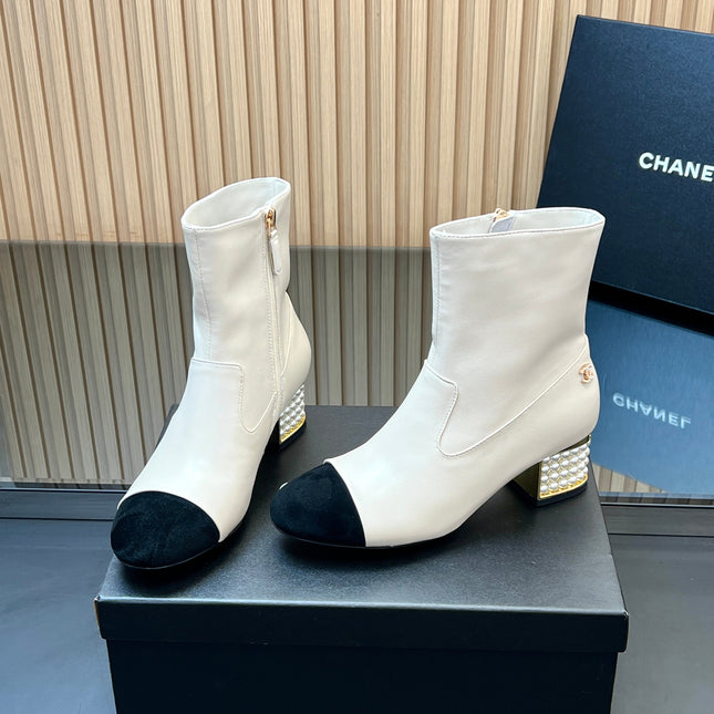 CHANEL 25S TALL BOOTS WITH PEARL DETAILS 50MM IN WHITE CALFSKIN AND BLACK SUEDE