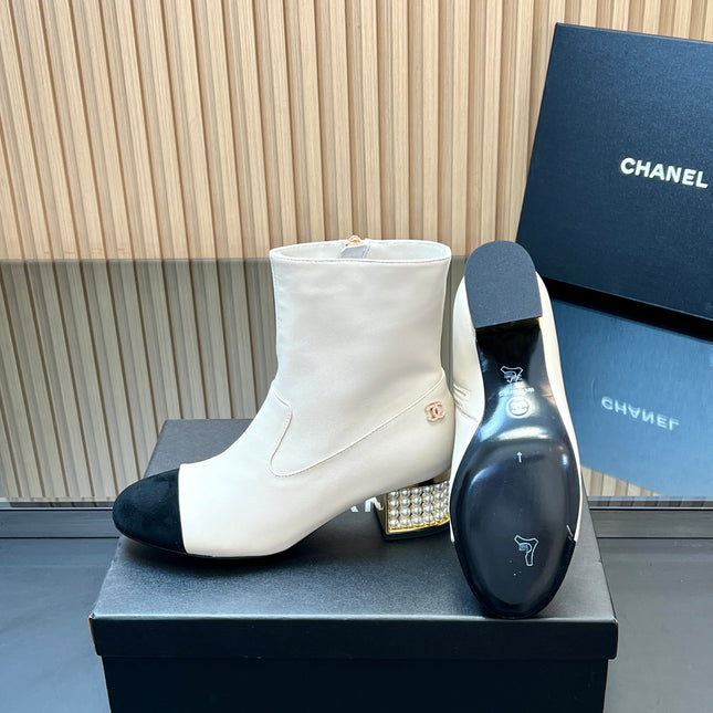 CHANEL 25S TALL BOOTS WITH PEARL DETAILS 50MM IN WHITE CALFSKIN AND BLACK SUEDE