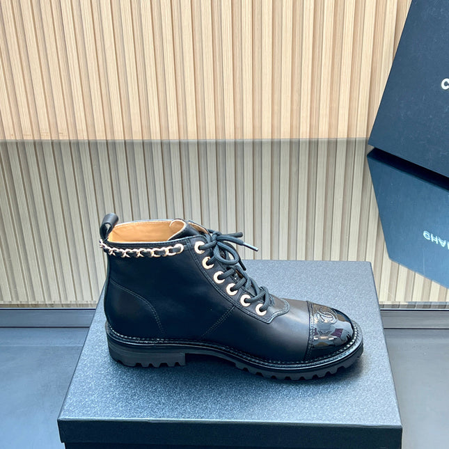 CHANEL 25S MARTIN LACE-UP BOOTS WITH CHAIN DETAIL IN BLACK CALFSKIN