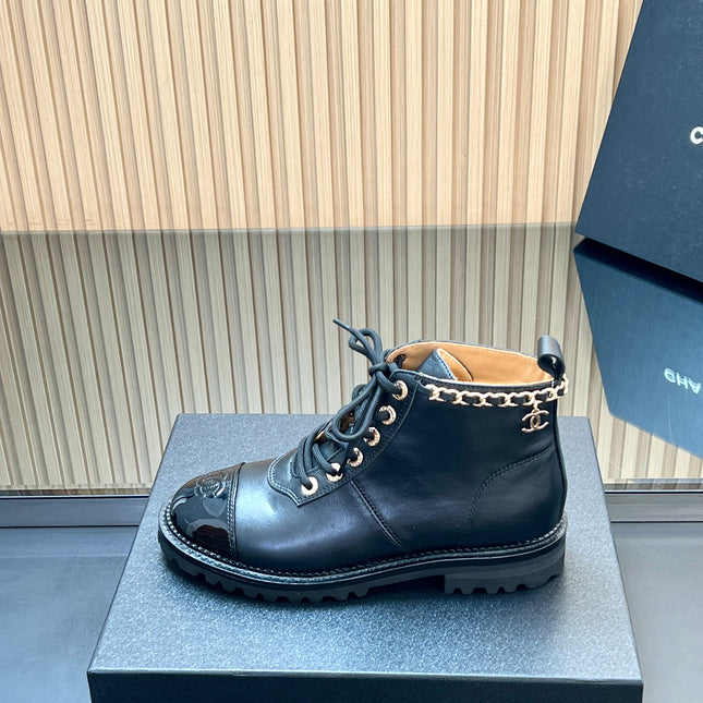 CHANEL 25S MARTIN LACE-UP BOOTS WITH CHAIN DETAIL IN BLACK CALFSKIN