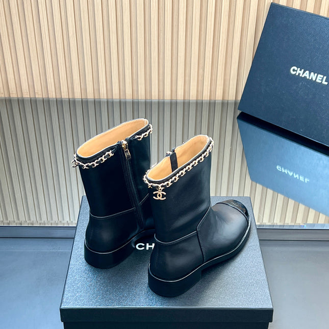 CHANEL 25S SHORT BOOTS WITH CHAIN IN BLACK CALFSKIN