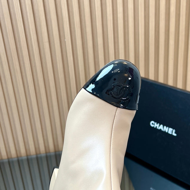 CHANEL 25S BOOTS WITH PATENT TOE CAP 50MM IN BEIGE AND BLACK CALFSKIN
