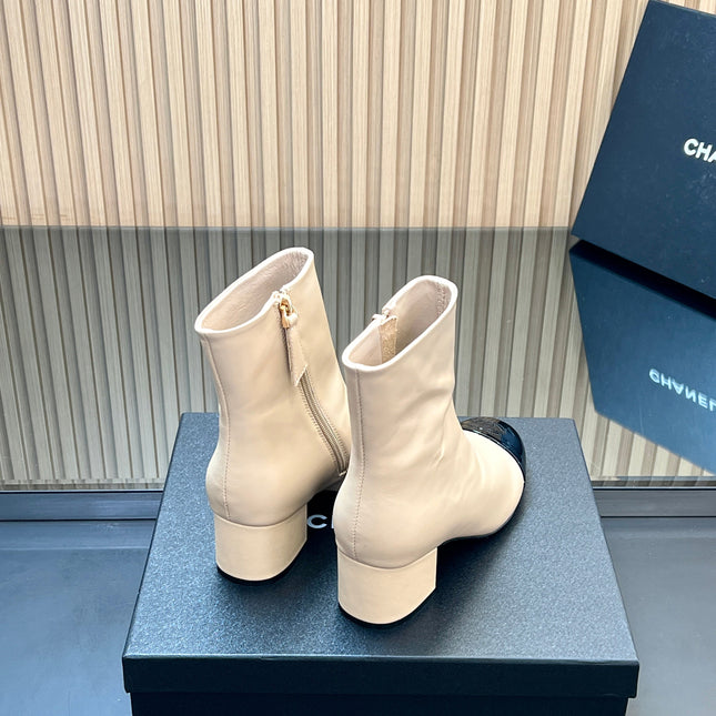 CHANEL 25S BOOTS WITH PATENT TOE CAP 50MM IN BEIGE AND BLACK CALFSKIN