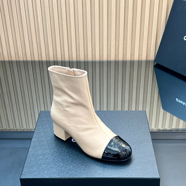 CHANEL 25S BOOTS WITH PATENT TOE CAP 50MM IN BEIGE AND BLACK CALFSKIN