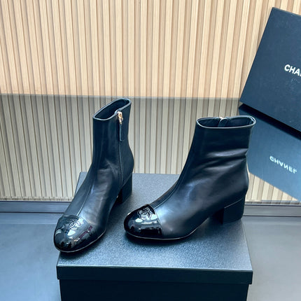 CHANEL 25S BOOTS WITH PATENT TOE CAP 50MM IN BLACK CALFSKIN
