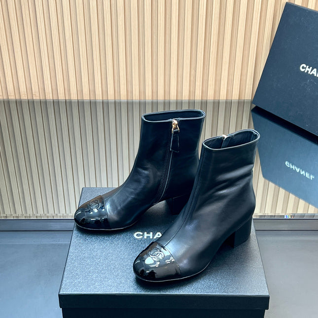 CHANEL 25S BOOTS WITH PATENT TOE CAP 50MM IN BLACK CALFSKIN