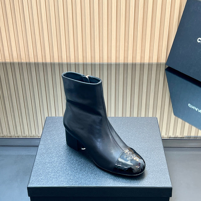 CHANEL 25S BOOTS WITH PATENT TOE CAP 50MM IN BLACK CALFSKIN