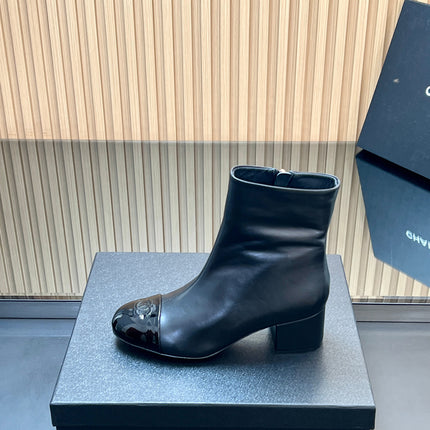 CHANEL 25S BOOTS WITH PATENT TOE CAP 50MM IN BLACK CALFSKIN