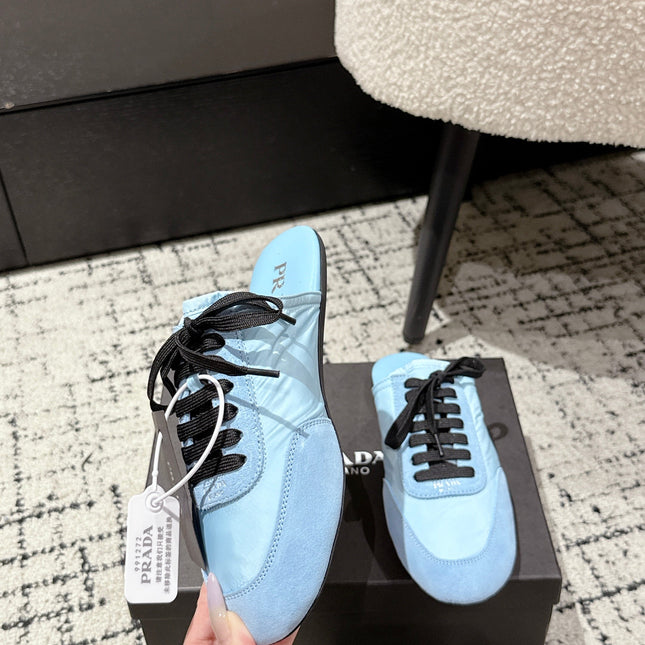 PRADA 25S DEXUN MULE IN LIGHT BLUE SUEDE LEATHER
