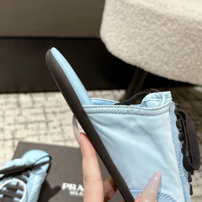 PRADA 25S DEXUN MULE IN LIGHT BLUE SUEDE LEATHER
