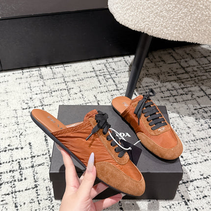 PRADA 25S DEXUN MULE IN BURNT ORANGE SUEDE LEATHER