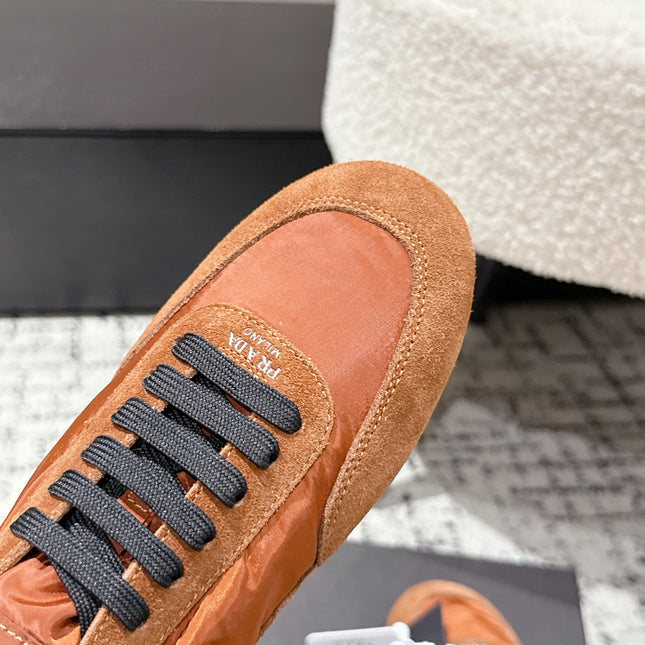 PRADA 25S COLLAPSE SNEAKERS IN BURNT ORANGE RE NYLON AND SUEDE